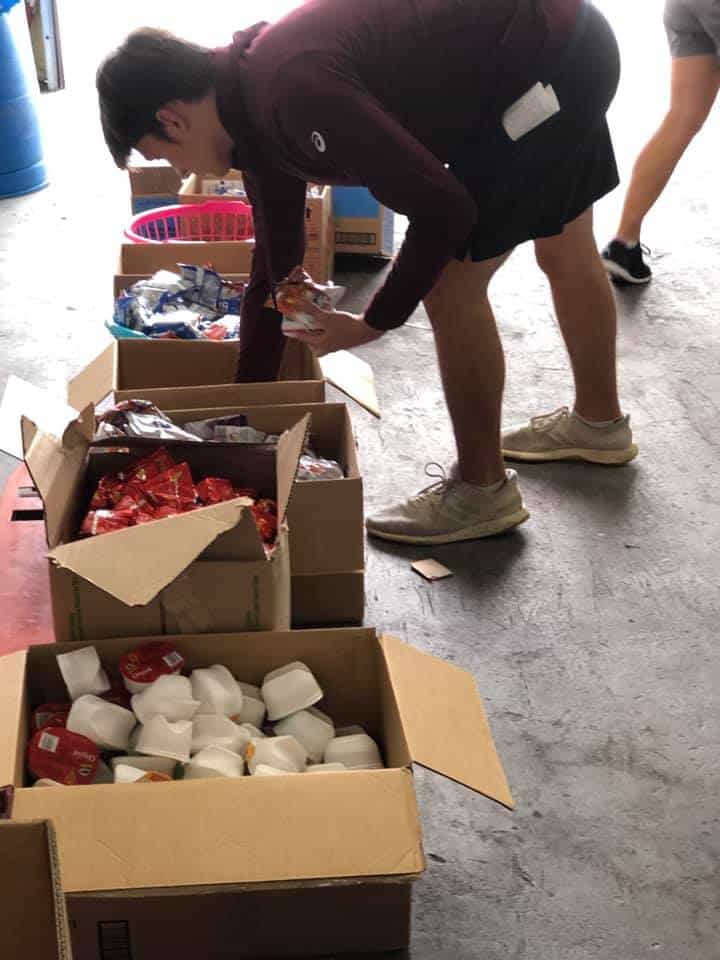 Kids Helping Kids Packing Food 1