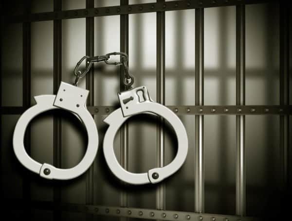 jail cuffs crime florida arrested