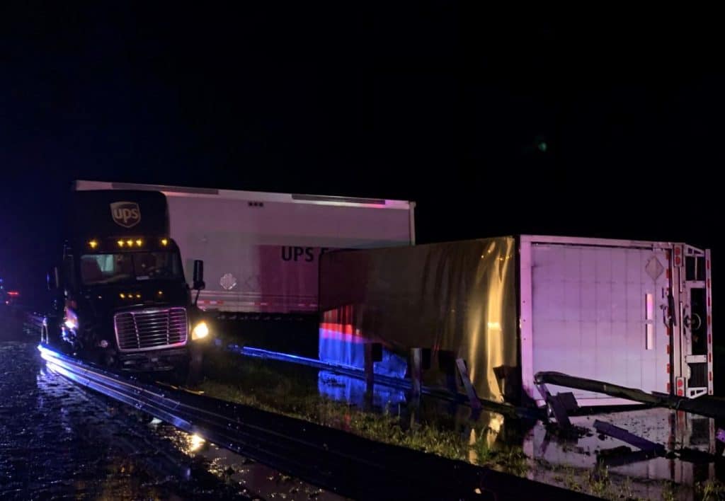 tractor-trailer was redirected to the median and collided