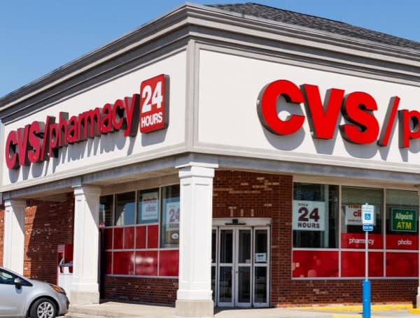 CVS Health tentatively agreed Wednesday to pay nearly $5 billion to states, counties and cities that filed opioid lawsuits and claims against the company.