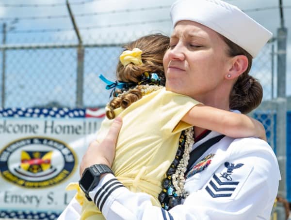 Tampa Native embraces daughter after eight-month deployment aboard U.S. Navy warship