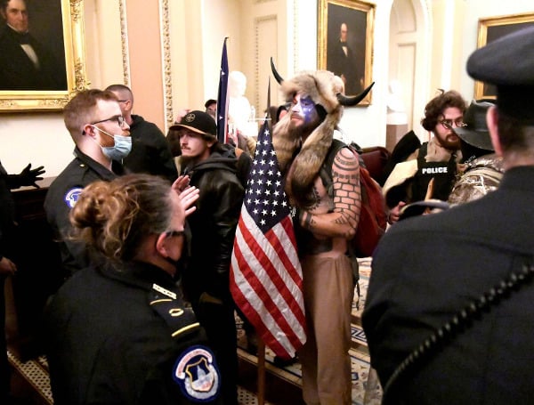 Prosecutors recommended late Tuesday that Jacob Chansley, the so-called “QAnon Shaman” who stormed the Capitol on Jan. 6 shirtless and wearing horns, go to prison for 51 months, a sentence that would be the longest for any rioter who participated.