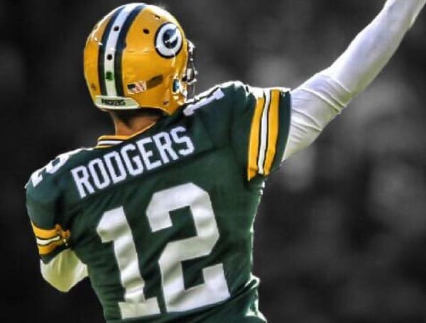 When the NFL season started, the sports rumor mill ran full blast that Green Bay Packers legendary quarterback Aaron Rodgers was not committed to the team and looking for the exit.