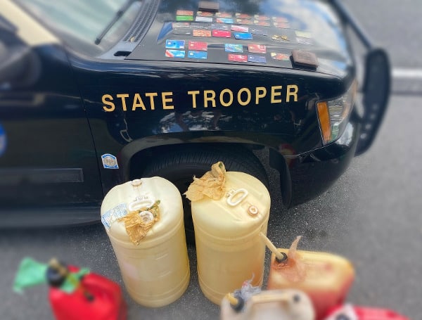 Florida Highway Patrol has arrested a Tampa man after a traffic stop for illegal window tint uncovered fraudulent credit cards and a boatload of fuel.
