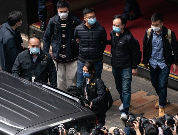 A pro-democracy news outlet in Hong Kong was shut down Wednesday after police arrested seven people associated with the site and raided its offices, multiple sources reported.