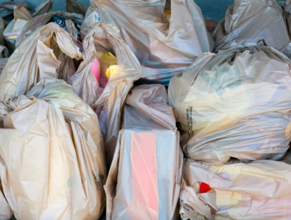 A California state commission requested that authorities crack down on retailers it accused of skirting plastic bag and pollution laws, Reuters reported.