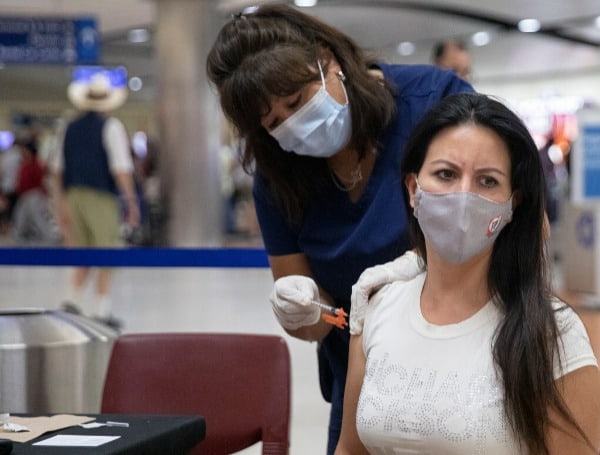 A group of Democratic lawmakers sent letters to the Federal Aviation Administration (FAA) and Centers for Disease Control and Prevention (CDC) on Monday asking officials to require proof of vaccination or a negative COVID-19 test to fly domestically.