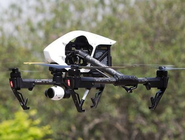 A Texas man plead guilty Wednesday to flying a drone loaded with drugs and other contraband into a prison.
