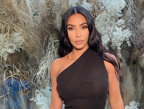 Kim Kardashian revealed that she doesn’t care about the backlash she received for working with former President Donald Trump on criminal justice reform in an interview with Bari Weiss.
