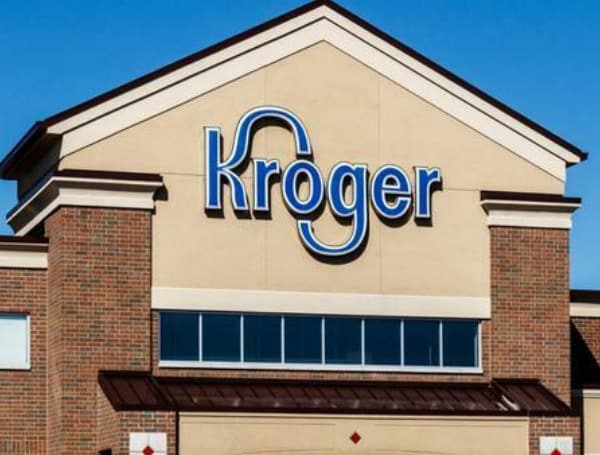 Supermarket chain Kroger announced Tuesday it will eliminate paid emergency leave for unvaccinated employees who contract COVID-19 in addition to requiring some of them to pay a monthly $50 health insurance surcharge starting in 2022, according to a company memo.