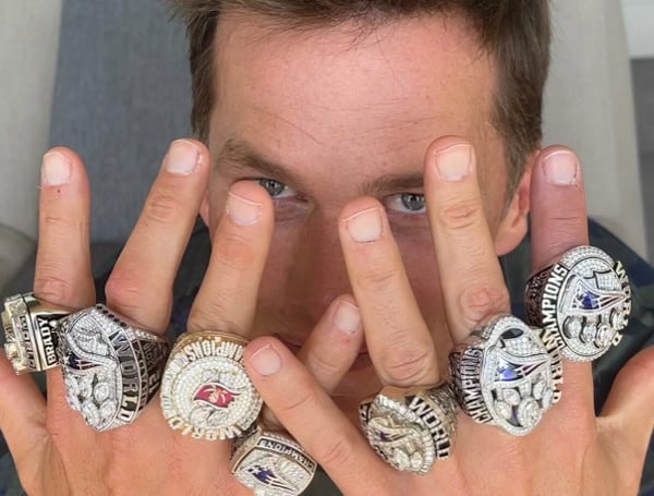 A New Jersey man on Monday pleaded guilty to multiple felonies for a scheme involving the sale of bogus Super Bowl rings that reportedly had belonged to Tampa Bay Buccaneers quarterback Tom Brady.