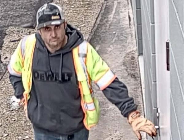 Lakeland Police are trying to track down a man who virtually smiled for the camera before stealing construction materials from a job site.