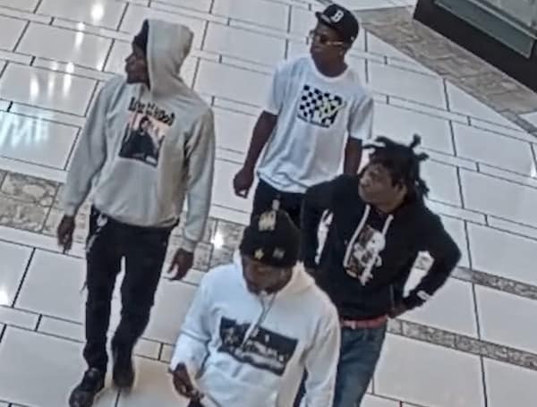 4 men attacked and robbed a single person