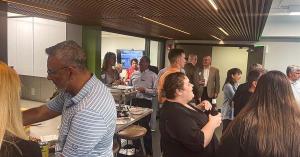 Partners, Employees, Friends, and Clients enjoying the Open House hosted by PRA