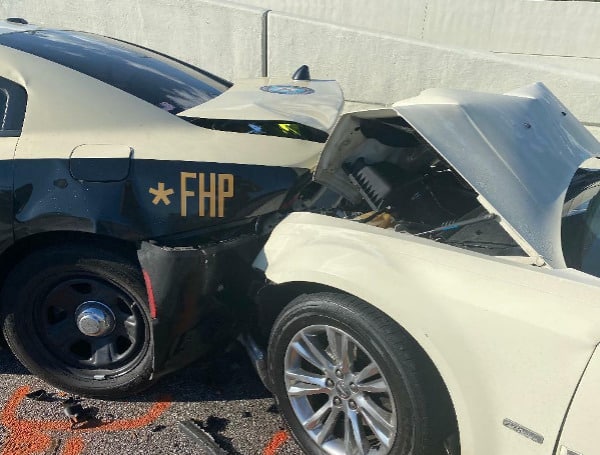 A Florida Highway Patrol Trooper was struck on I-75 Sunday, while stopped to help motorists involved in a minor crash.