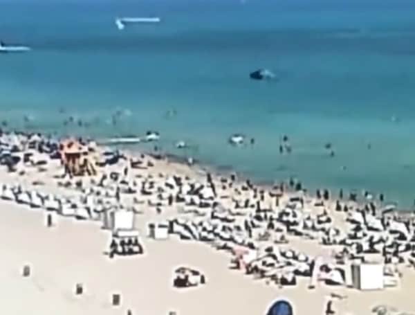 Beachgoers at one Florida beach had a frightening surprise Saturday afternoon as a helicopter crashed into the ocean near the beachline.