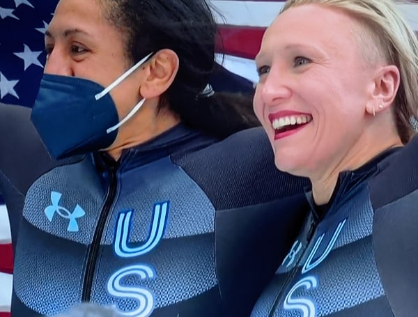 An olympian who left team Canada’s bobsledding team after filing harassment allegations won the gold medal Sunday for the U.S., multiple sources reported.