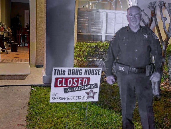 While on one of his Friday night patrols, Flagler County Sheriff Rick Staly joined his Special Investigations Unit and SWAT Team to close down a drug house in the Grand Haven community.