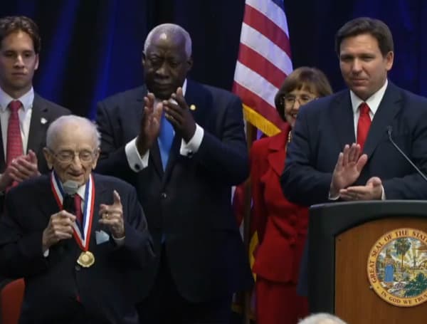 Boca Raton resident Benjamin Ferencz, who was an investigator of Nazi war crimes, was presented with the Governor’s Medal of Freedom on Thursday after Gov. Ron DeSantis signed a bill that will help continue the award program. 