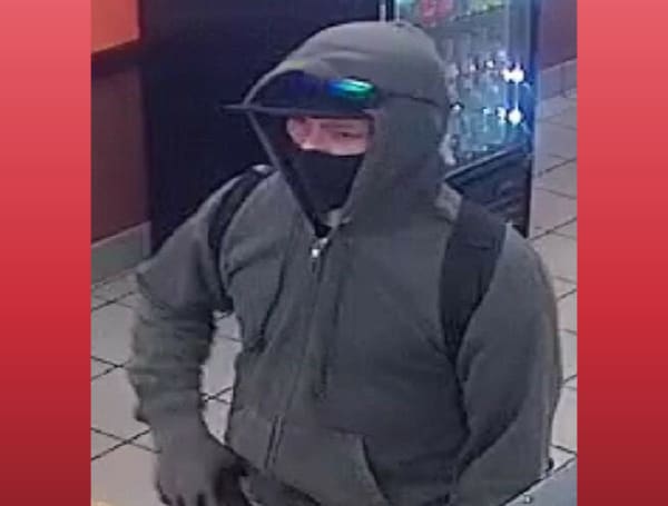 The New Port Richey Police is looking for the public's help in identifying a Dunkin Donuts armed robbery suspect.  