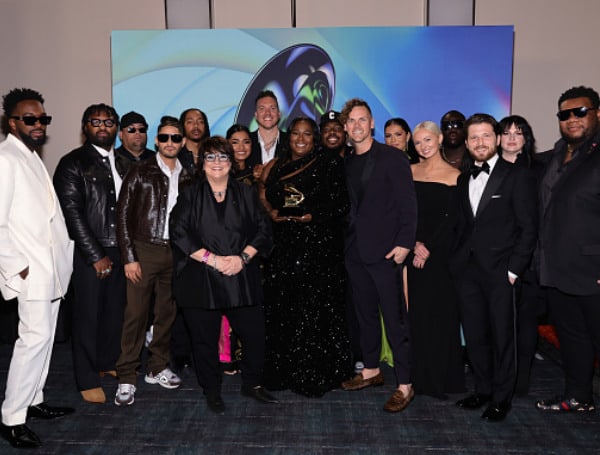 Tiffany Hudson is pictured fifth from the right in a group photo of Elevation Worship and Maverick City Music