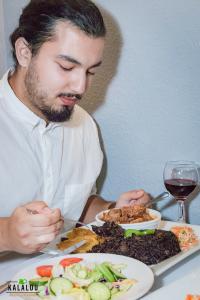 7231153 guest enjoying oxtail entree wi 200x300 1