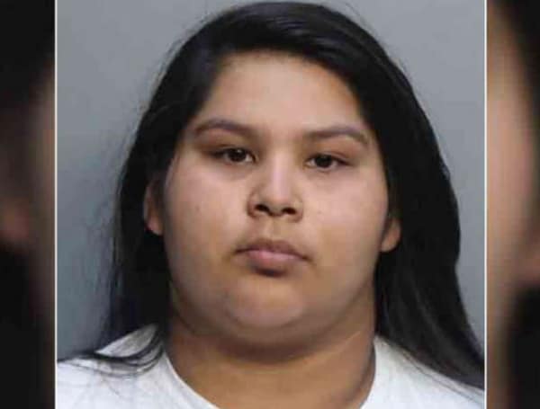 A Florida mother was arrested on a manslaughter charge after authorities said her 7-month-old son drowned in a bathtub while she was in the garage doing her nails.