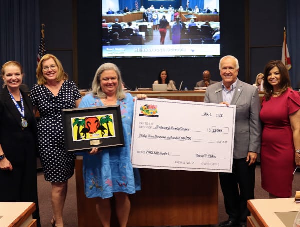 Hillsborough County Tax Collector, Nancy C. Millan, was honored to present the results of their first-ever Kids Tag Art Program to the Hillsborough County School Board. 