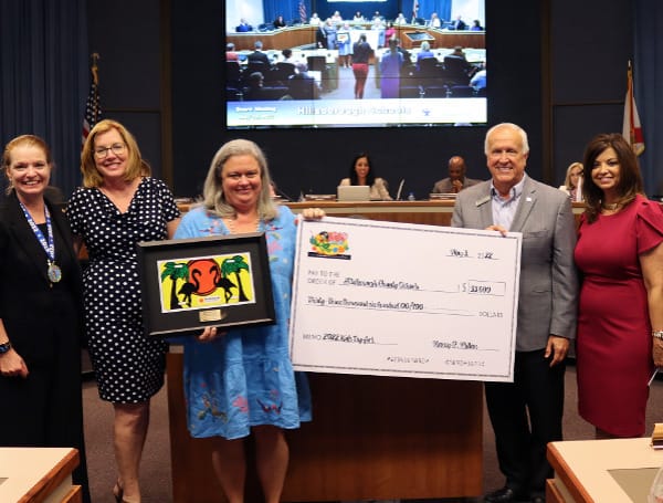 Hillsborough County Tax Collector, Nancy C. Millan, was honored to present the results of their first-ever Kids Tag Art Program to the Hillsborough County School Board.