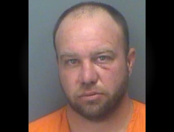 A Florida man has been charged with first-degree murder after a man was discovered dead in a garage.