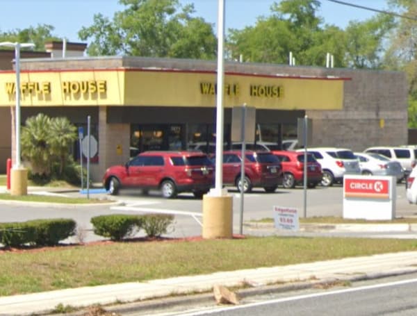 A 28-year-old victim was shot in the face after a shooting altercation between two groups took place at a Waffle House location.