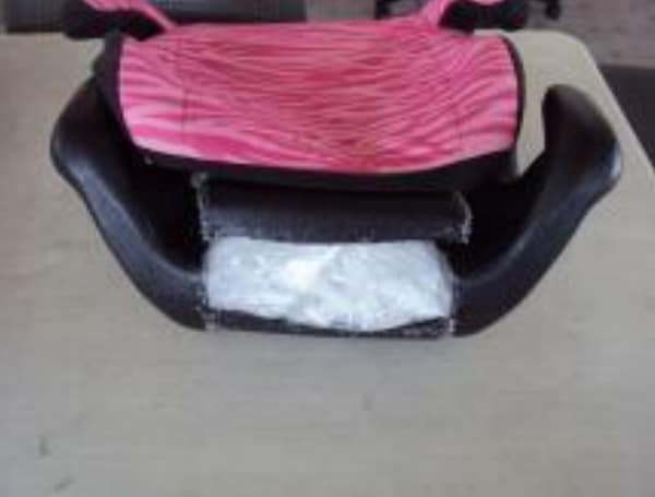 Border Patrol K9 team alert agents to children booster seats, and with further inspection agents found several packages of methamphetamine.