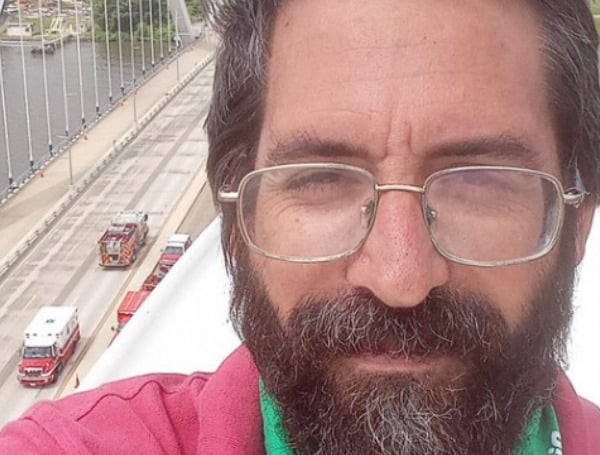 A man climbed the Frederick Douglass bridge in Washington, D.C., Friday to protest the Supreme Court’s decision to overturn Roe v. Wade.