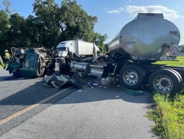Troopers say a semi-truck driven by a 65-year-old man from Summerfield, Florida, partially entered the outside line and hit the left rear of another truck driven by a 23-year-old from Harrisonburg, Virginia. 