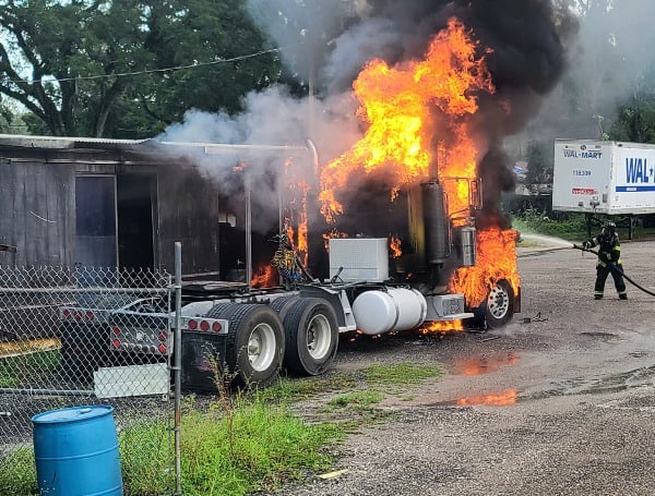 Hillsborough County Fire Rescue responded to a large vehicle fire with an exposure Sunday afternoon in Tampa.