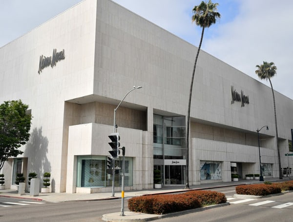 Thieves crashed a car into a Neiman Marcus store in Beverly Hills Sunday morning, stole an unknown amount of merchandise, and disappeared before the police arrived, according to the Beverly Hills Police Department.