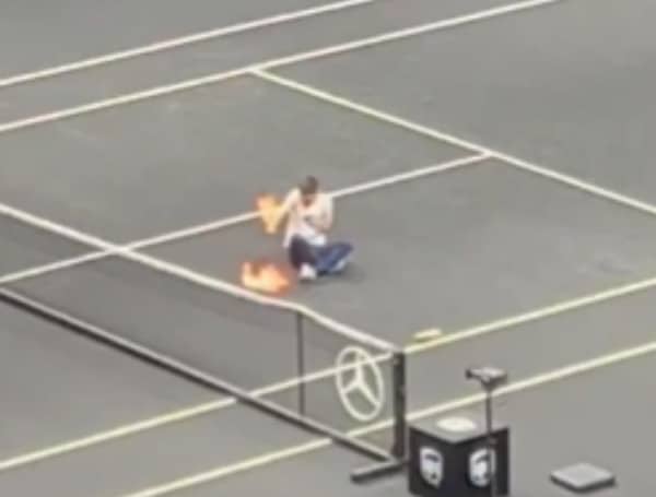 A man set himself on fire at a London tennis match Friday in an act of climate-related protest, according to The Telegraph.