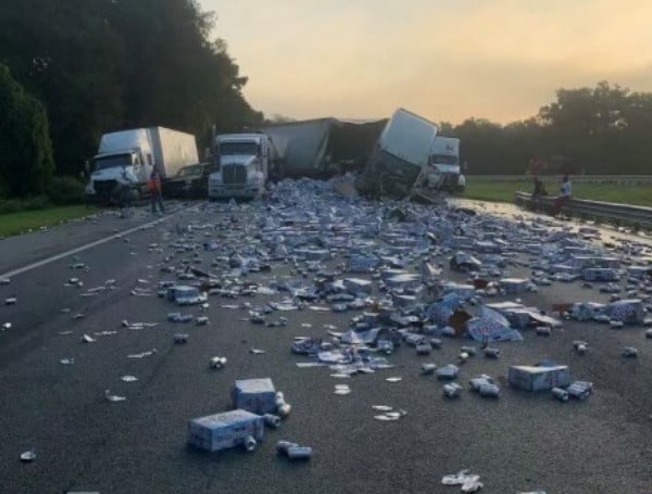 Five semi-trucks and one pickup truck were involved in a crash that left I-75 covered in Coors Light.