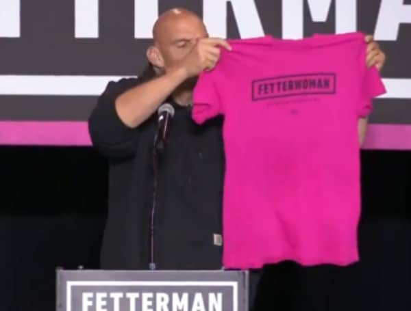 Pennsylvania's Democratic Senate nominee John Fetterman slammed Republican Mehmet Oz over his past remarks calling abortion "murder" and warned that Oz would be a "rubber stamp" for a national ban at a rally on Sunday.