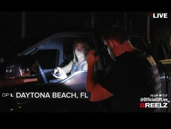 A Florida man was detained on LIVE TV for street racing and cited for reckless driving.