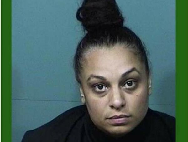 A Florida woman was jailed after she threatened to beat up the school principal and then blow up the school, according to investigators.