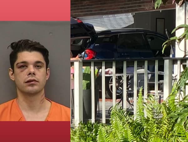 The Tampa Police Department has arrested a man who drove his SUV through a south Tampa business on Tuesday morning while attempting to hit a woman.