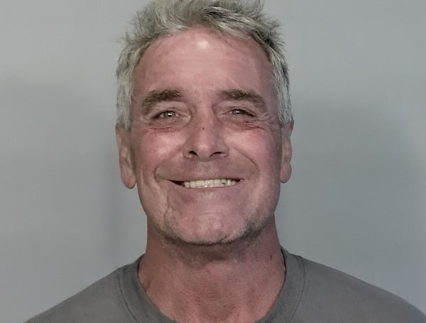 A 56-year-old homeless Florida man was arrested Tuesday after attempting to set tents on fire and attacking a person with a metal grate.