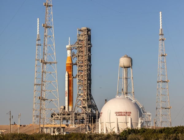 A view of the Artemis I Space Launch System (SLS) and Orion spacecraft just before sunrise at Launch Complex 39B at NASA’s Kennedy Space Center in Florida on March 23, 2022. Credits: NASA/Ben Smegelsky