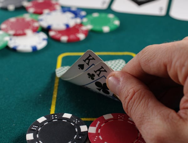 Poker Face: Retired Military Officer Sues USF Professor Over Alleged Bad Book Deal