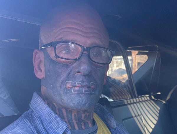 A California man has been arrested after being spotted by a keen officer that noticed the man's tattoos. 