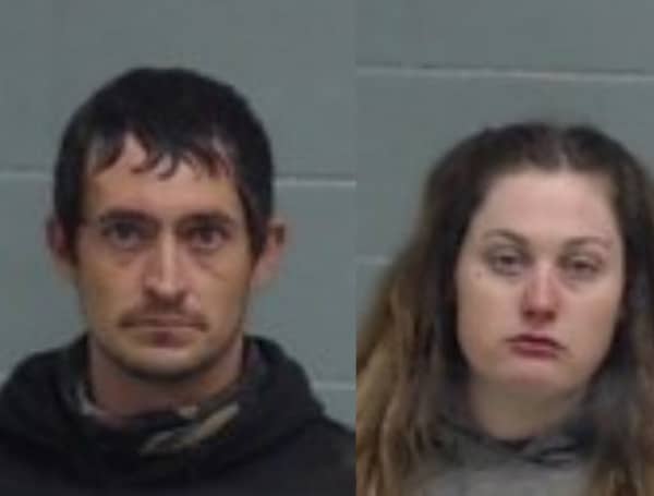 A traffic stop on Christmas Day led to the arrest of two individuals on methamphetamine trafficking charges.