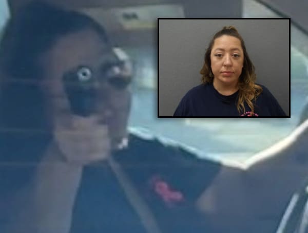A 35-year-old Florida woman was arrested Friday after pointing a handgun during a road rage incident with a child in the backseat. 