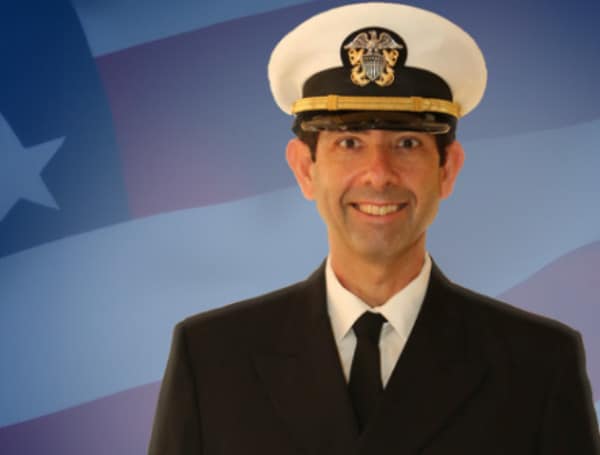 A Miami-Dade County circuit judge could face a public reprimand from the Florida Supreme Court because of campaign advertisements that showed him in a U.S. Navy uniform. 