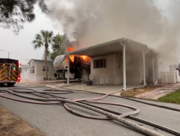  Pasco County Fire Rescue is working to knock down a fire involving a fifth-wheel Rv, a mobile home, and a shed, in Winters Quarters Mobile Home Park in Land O' Lakes, according to officials. 